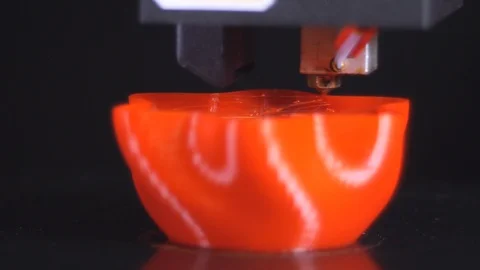 3D printer printing a red vase, Black background Stock Footage 104398081