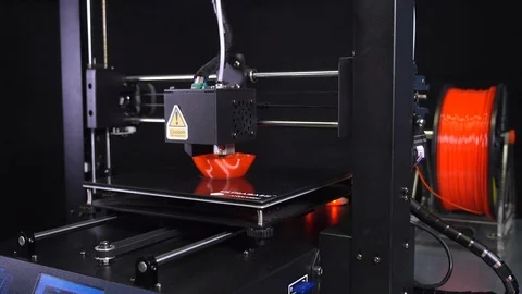 3D printer printing a red vase, Black background Stock Footage 104401619