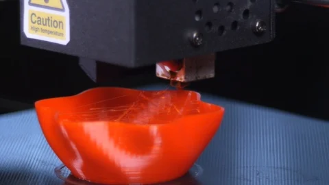 3D printer printing a red vase, Black background Stock Footage 104401936