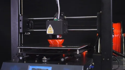 3D printer printing a red vase, Black background Stock Footage 104402839
