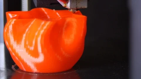 3D printer printing a red vase, Black background Stock Footage 104412568