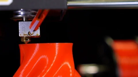 3D printer printing a red vase, Black background Stock Footage 104416126