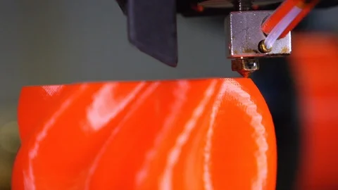 3D printer printing a red vase Stock Footage 104742728