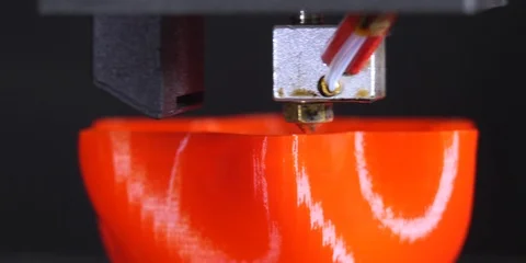 3D printer printing a red vase, Black background Stock Footage 104827819