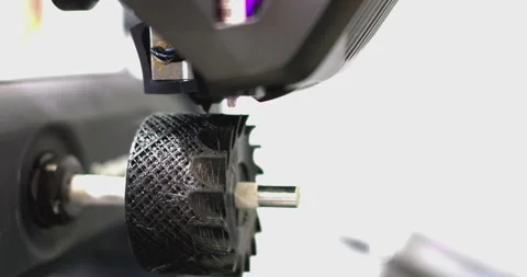 3d printer printing a small wheel isolated on white background Stock Footage 315028778
