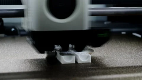3D Printer Printing Toy in Fast Motion Macro View Stock Footage 332137366