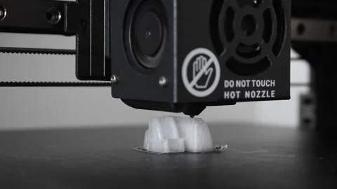 3d printer printing a white object, close-up Stock Footage 249249410