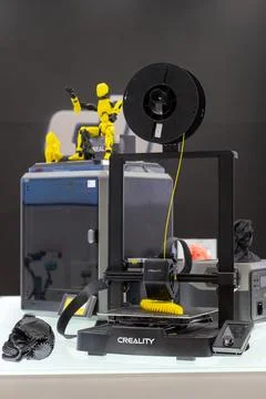 3D printer printing a yellow object model. Minsk, Belarus - March 16, 2025 Foto stock