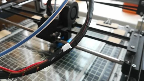 3d printer prints black detail. Homemade 3d printer. 動画素材 111407071