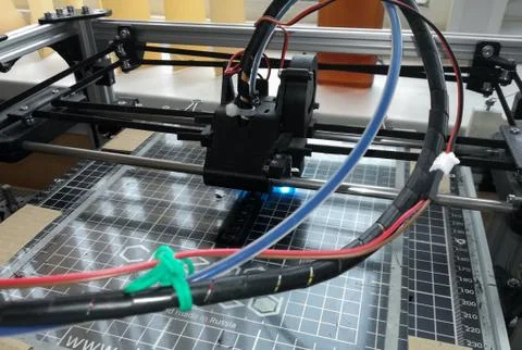 3d printer prints details. work at the factory Stock Photos