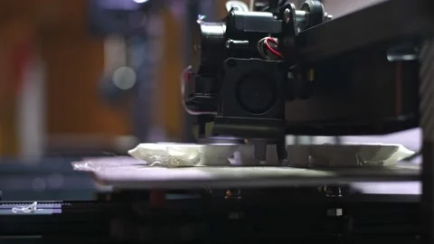 A 3D printer prints a model from white plastic. modern technologies, 3D modeling Stock Footage 269491367
