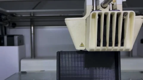 3d printer prints object close-up. Automatic three dimensional 3D printer Video stock 262857738