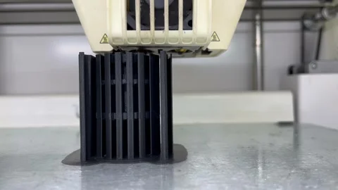 3d printer prints object close-up. Automatic three dimensional 3D printer Stock Footage 262857774