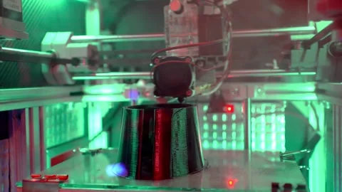 A 3D printer prints plastic parts using fused filament manufacturing technology Stock Footage 329242611