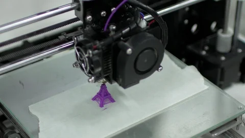 3d printer prints an purple eiffel tower Stock Footage 92810030