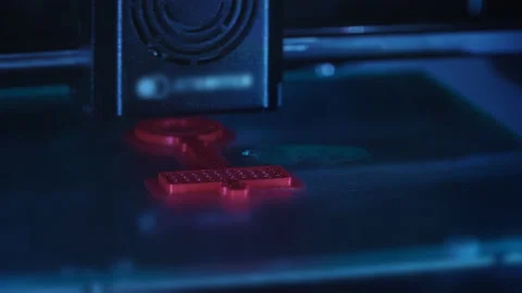3D printer prints a red model Stock Footage 167735787