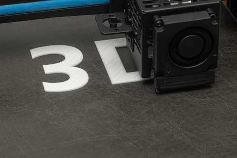 3D printer prints the word 3D with white filament PLA Stock-Fotos