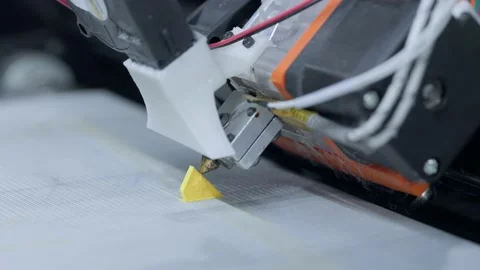 3D printer producing the details. Printing elements on 3d printer machine Stock Footage 236781313