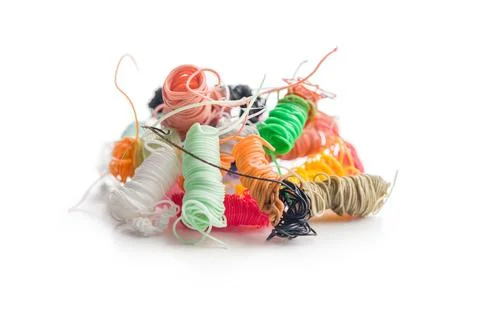 3D printer waste. Plastic filament poops isolated on white background. Stock Photos