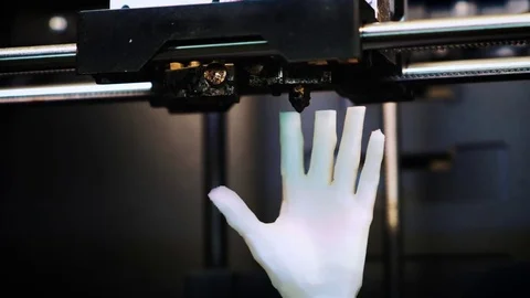 3D printer at work, 3D printer print the human hand, 3D printer print the whiter Stock Footage 79740272