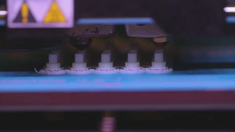 3D printer working. 3D printer printing an object from plastic. Automatic three Stock Footage 114175789