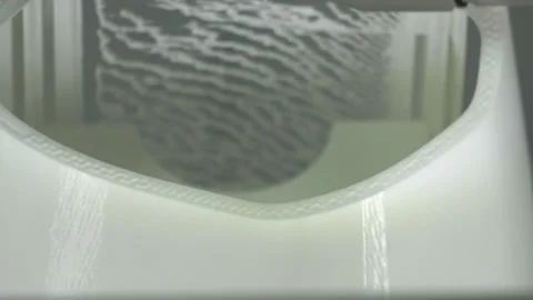 3D printer working. 3D printer printing an object from plastic. 4K. Video stock 131988904