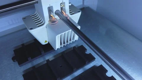 3D printer working. 3D printer, printing with plastic wire filament Stock Footage 140222971