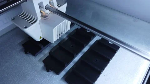 3D printer working. 3D printer, printing with plastic wire filament Stock Footage 140222982