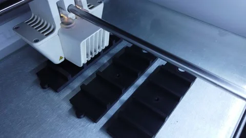 3D printer working. 3D printer, printing with plastic wire filament Stock Footage 140223003