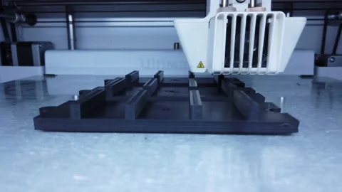 3D printer working. 3D printer, printing with plastic wire filament Stock Footage 140223206