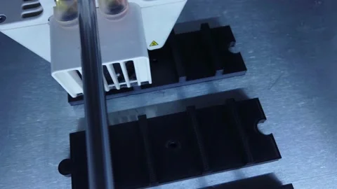 3D printer working. 3D printer, printing with plastic wire filamen Stock Footage 140223383