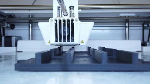3D printer working. 3D printer, printing with plastic wire filamen Stock Footage 140874000