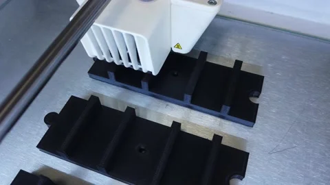 3D printer working. 3D printer, printing with plastic wire filamen Stock Footage 140874132