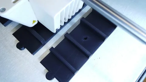 3D printer working. 3D printer, printing with plastic wire filamen Stock Footage 140874603