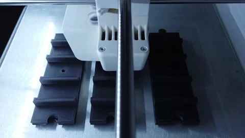 3D printer working. 3D printer, printing with plastic wire filamen Stock Footage 140874614