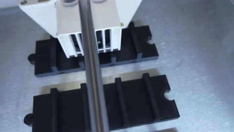 3D printer working. 3D printer, printing with plastic wire filamen Stock Footage 140874698