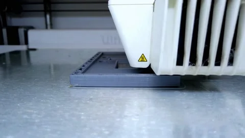 3D printer working. 3D printer, printing with plastic wire filament Stock Footage 149000456