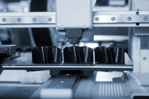3D printer Working 3D printer process printing object molten black plastic Stock Photos