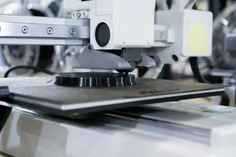 3D printer Working 3D printer process printing object molten black plastic Stock Photos