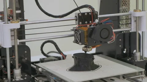 3D printer working close up. Automatic three dimensional 3d printer performs Stock Footage 107256392