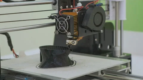 3D printer working close up. Automatic three dimensional 3d printer performs Stock Footage 107256746