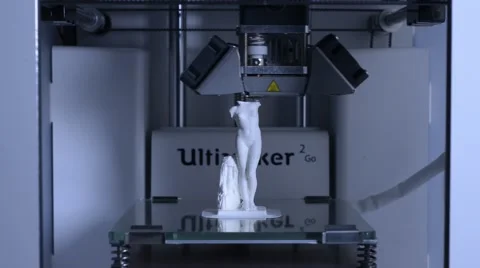 3D printer working, printing a Venus figure Stock Footage 67605260