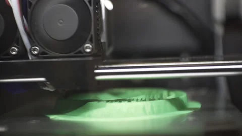 3D printer works close-up. 3D high-tech digital printer computer machine in acti Stock Footage 120610578