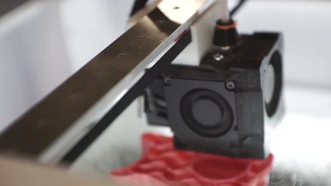 3D printer works close-up. Three-dimensional 3D printer makes a plastic figure. Stock Footage 120610725