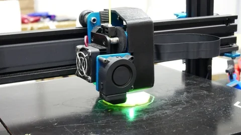 3D printers are printing digital images from computers in 3D form. Image Video stock 122973037