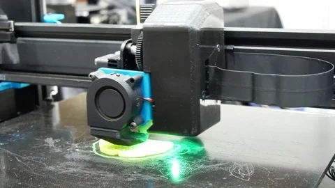 3D printers are printing digital images from computers in 3D form. Image Video stock 122973042