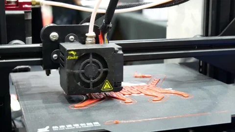 3D printers are printing digital images from computers in 3D form. Image Video stock 122973294
