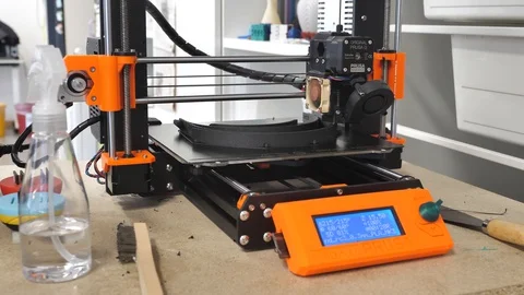 3D Printers at work creating DIY COVID19 Masks Stock Footage 127712443