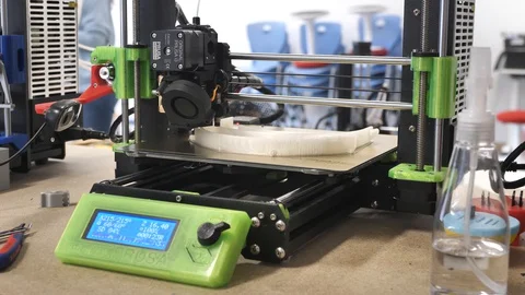 3D Printers at work printing with plastic filament Stock Footage 127713324