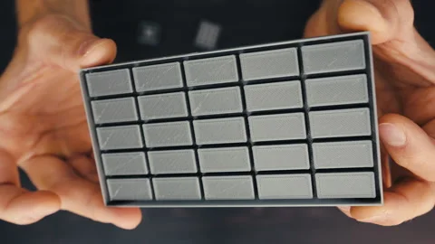 3D Printing Demonstration: Close-up of Hands Creating Plastic Parts, Top View Video stock 251175803